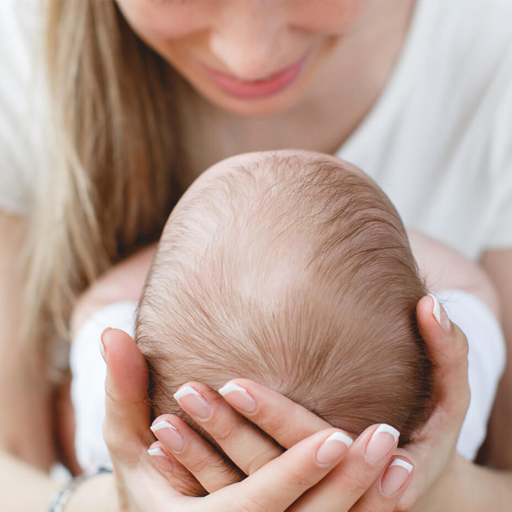 Mother holding baby